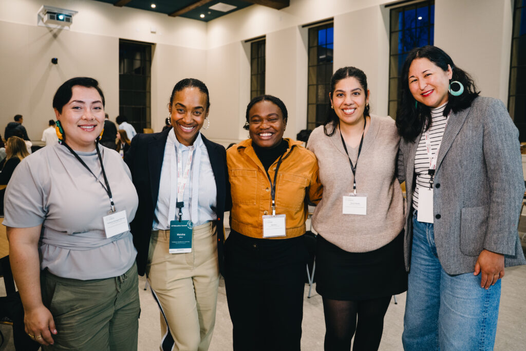 The Equity in Learning Initiative team poses for a photo.