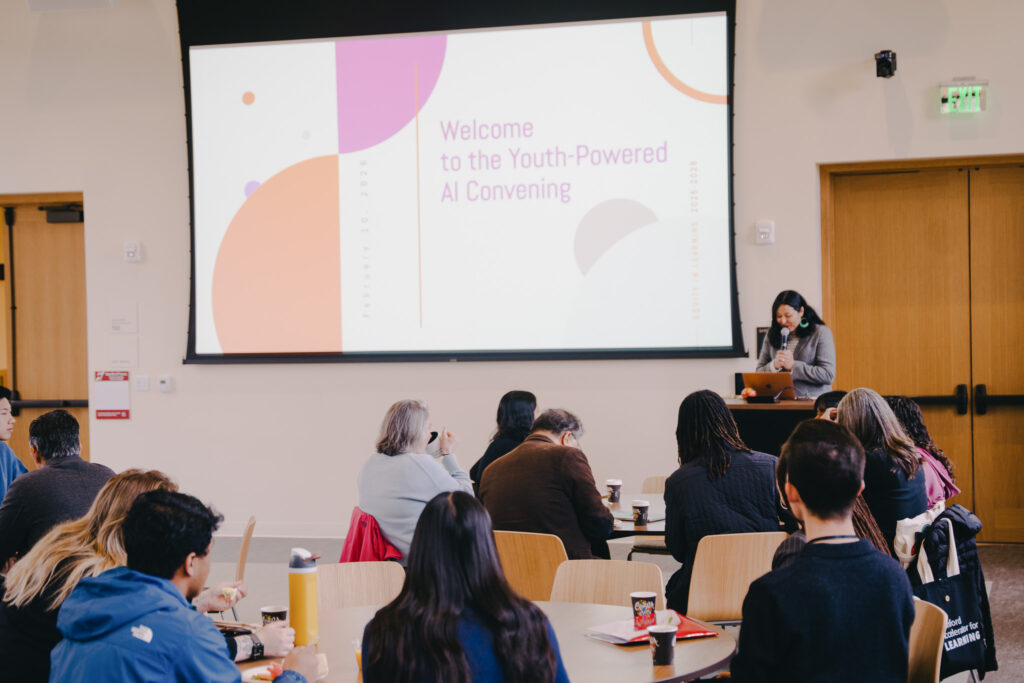 Christina Hewko presents to open the day.