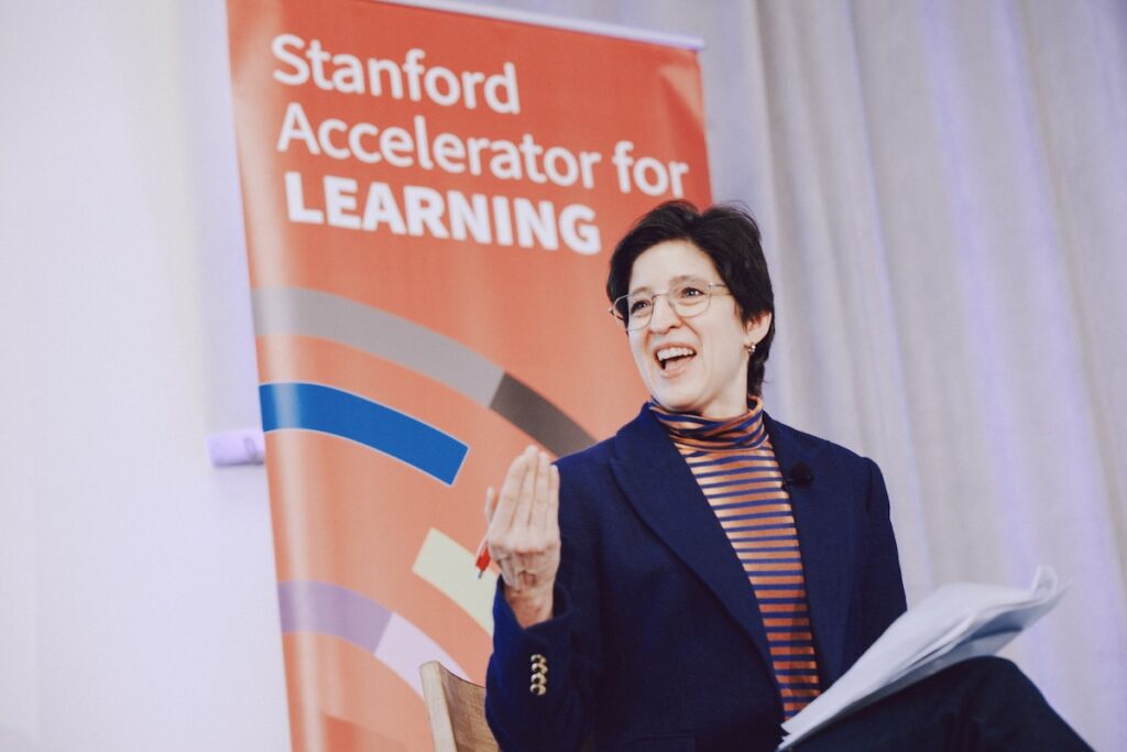 Susan Athey speaks onstage.