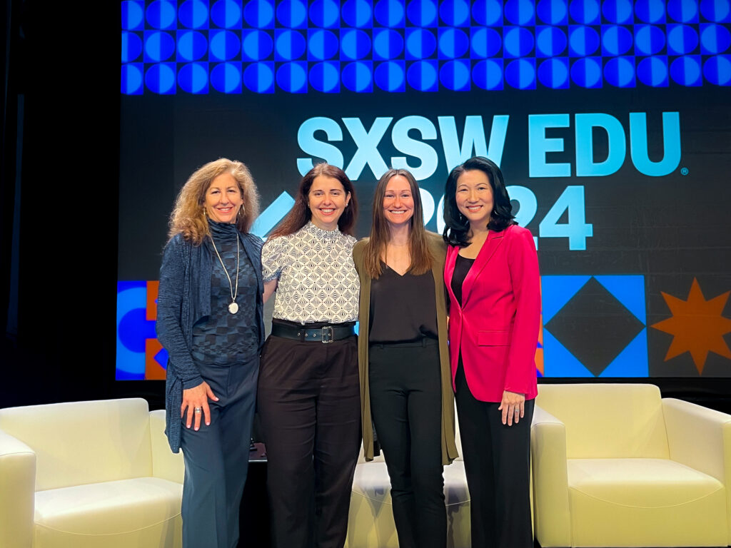 Four women stand together on a South by Southwest Edu 2024 stage.