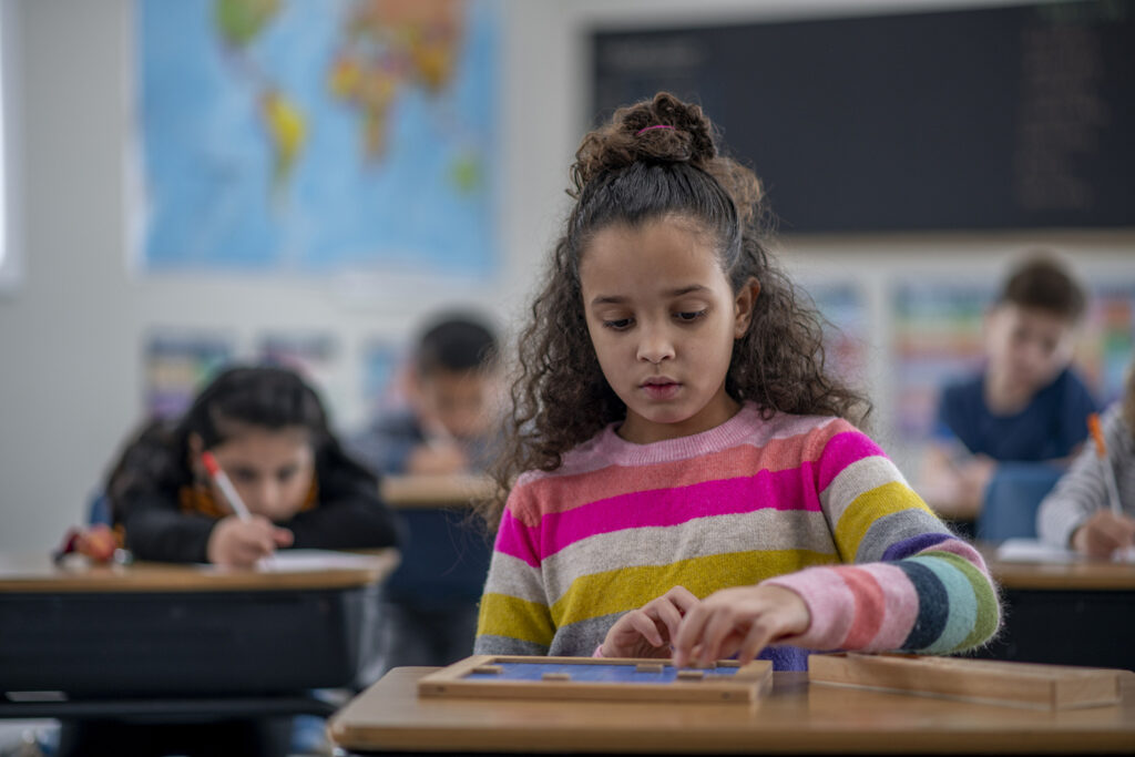 School girl working on her math skills